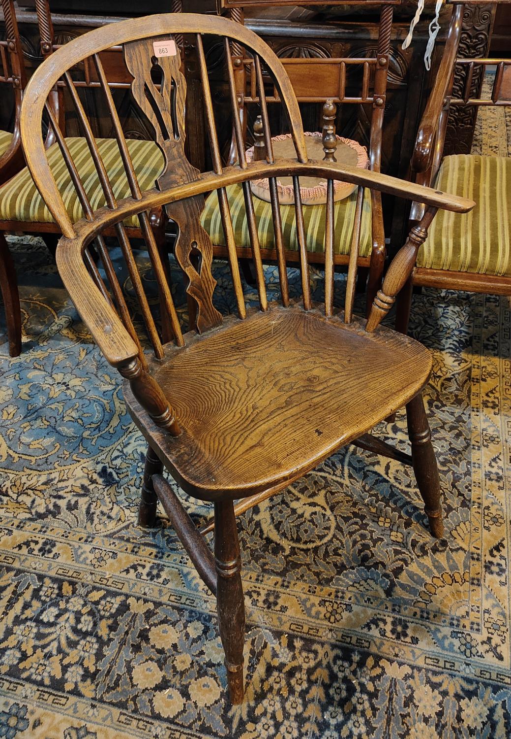 A 19th century elm Windsor armchair