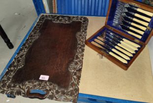 A carved wood Black Forest style tray with carved wine decoration and a boxed set of silver plated