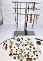 A selection of vintage costume jewellery including 2 white metal watch chains, other chains,