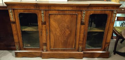 A mid Victorian figured walnut break-front credenza with ormolu mounts and floral marquetry inlay,