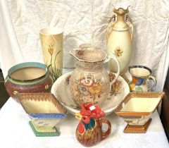 A Victorian floral jug and bowl set; a Doulton style stoneware jardinière; Art Deco vases; etc.