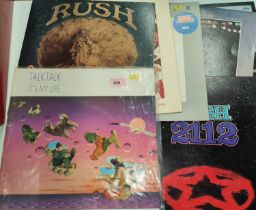 Four Rush LP's 'Caress of Steel', 'A Farewell to Kings', 'All the Worlds a Stage' '2112' and 3