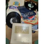 Elvis e.p. collection, white slip case edition and a good selection of similar singles.