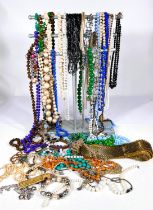 A large selection of costume jewellery mainly bead necklaces