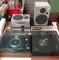 A collection of vintage record decks a similar equipment pair of speakers etc