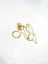 A 9 carat gold wedding band, 1.9gm; an 18 carat gold pair of earring backs, 2.2gm; a 9 carat gold