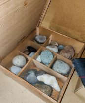 A collection of Japanese scholar stones in box