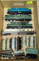 Four diesel locomotives:  Hornby; Lima; Airfix; a selection  of rolling stock, 00 gauge