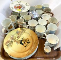 A large selection of collectors' and decorative plates and mugs