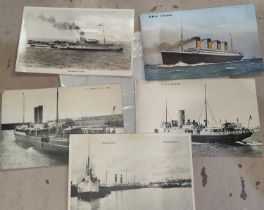 A 1912 Titanic post card and a small collection of other liner cards.