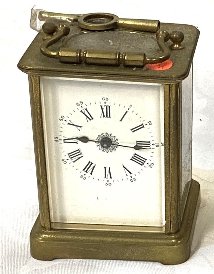 A 20th century brass carriage clock; a reproduction brass carriage clock; a period style brass - Image 4 of 6