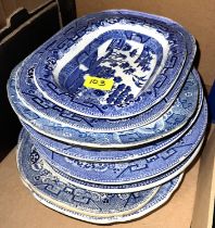 A selection of 19th century willow pattern plates and dishes