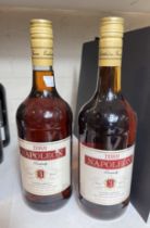 2 x 1 litre bottles of 3 years old Napoleon Brandy.