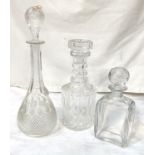 A cut glass mallet shaped decanter, and 2 others, 28cm