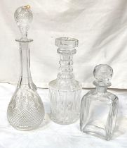 A cut glass mallet shaped decanter, and 2 others, 28cm