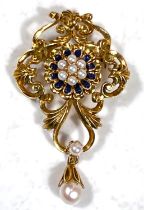 An antique pearl and blue enamel pendant/brooch with central 7 pearl cluster surrounded by blue