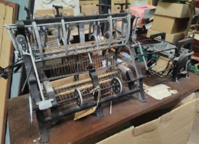 An unusual small scale model of a weaving machine