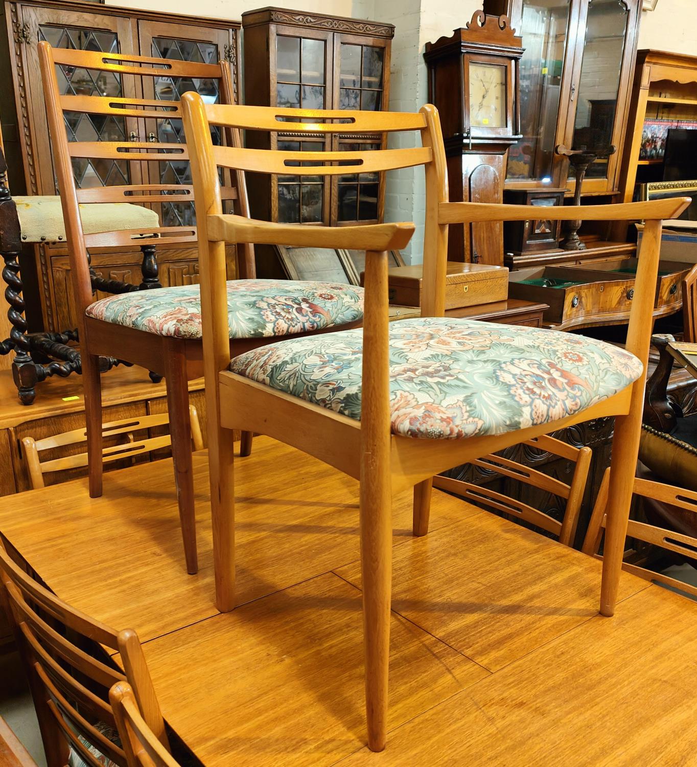 A 1970's G Plan style teak dining suite, comprising of a rectangular extendable table and 6 - Image 2 of 2