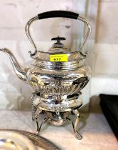 A silver plated kettle on stand with inscription, other silver plated trays other silver plated