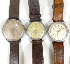 A vintage Smiths gents watch, an Ingersoll gents watch, another and a part sterling silver watch