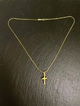 A modernist cross pendant, stamped 750, on reticulated rattail chain, stamped 750, 10gm
