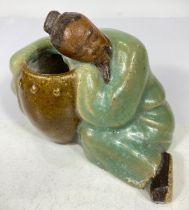 A Chinese stoneware figure 'Drunken Poet', ht. 10cm