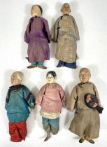 A collection of five Chinese late 19th/early 20th century 'Door of Hope' style dolls with detailed