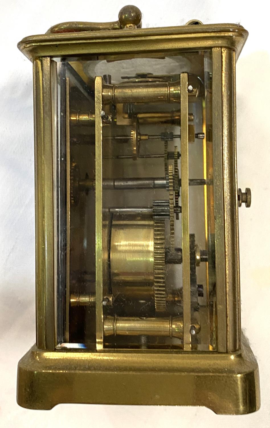 A 20th century brass carriage clock; a reproduction brass carriage clock; a period style brass - Image 5 of 6