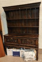 A late 19th/early 20th century Welsh dresser in the Georgian style with 2 height delft rack over 2