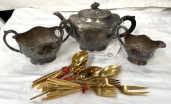 A Rococo style 3 piece silver plated tea service; a quantity of gilded cutlery