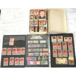A collection of Russian cosmonaut match boxes in another box and a collection of Chinese stamps etc