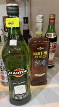 3 bottles of Martini and other Vermouth.