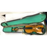 A 20th century Lark students violin with two piece back, carry case and two bows