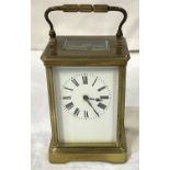 A 19th century large brass carriage clock with timepiece movement, height 14cm