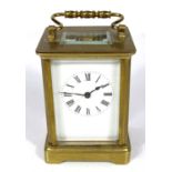 A 19th century French carriage clock with white dial and timepiece movement