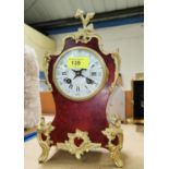 A 19th century Louis XV style mantel clock in tortoiseshell effect case with extensive ormolu mounts