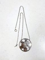 Georg Jensen:  a silver openwork circular pendant designed by Arno Malinowski, Moonlight Blossom,