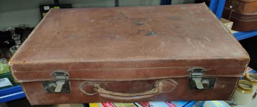 A vintage leather suitcase.