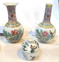 A 20th century Chinese bulbous vase with slender neck decorated in the famille rose manner, with