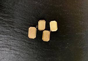 A 9 carat hallmarked gold pair of cufflinks of canted rectangular form, 4.5gm