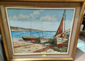 E Koscaya - fishing boats drawn up on beach, oil on canvas, signed 59 x 46cm, framed