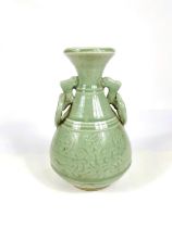 A Chinese celadon glazed vase with Kyin dragon and ring handles, 22cm