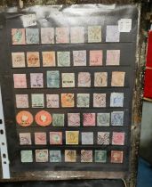 A collection of Victorian stamps on sheets.