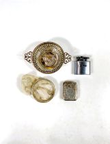 A hallmarked silver vesta case, monogrammed; a silver rimmed strainer; a pierced silver bonbon dish,