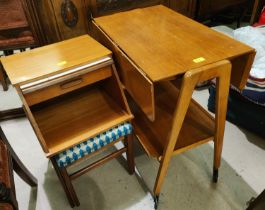 A mid century light oak drop leaf trolly with drip ends , a teak hall seat