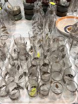 6 clear glass liqueur de cantes with etched and silvered decoration and approx. 40 similar design "