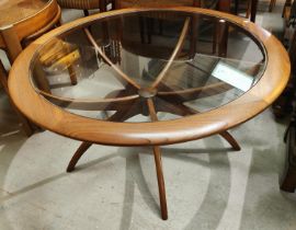 A 1960's/70's G-Plan coffee table with circular glass top " Astro/Spider " in the manner of Victor