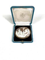 A 9ct gold surrounded cameo brooch with classical Greek Gods scene, length 6cm, 19gm gross