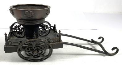 A Japanese bronze table ornament in the form of a rickshaw, 27cm length