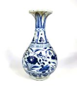 A Chinese blue and white vase of ovoid form with flared rim decorated with flowers and birds, 34cm